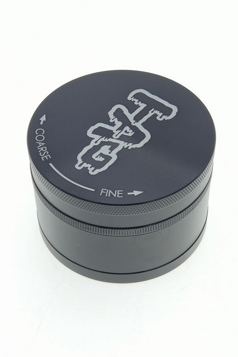TAG - 3" Four Chamber Grinder (120 Micron) Wavy Engraved Logo - Black .01